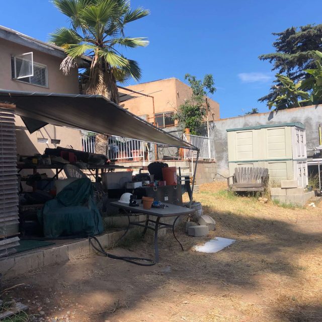 Before picture of Backyard landscape before renovation